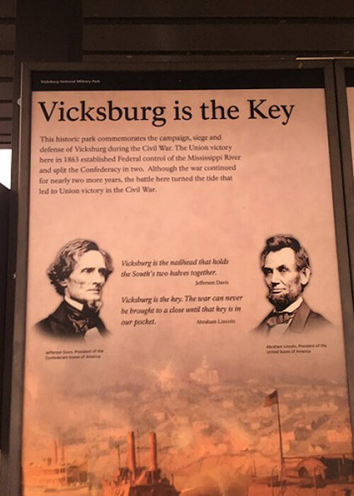 Display case at Vicksburg Civil War site what reads "Vicksburg is the key," with drawings of Abraham Lincoln and Stephen Douglas.