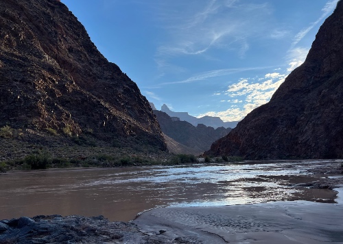 looking down muddy Colorado River at bottom of Grand Canyon